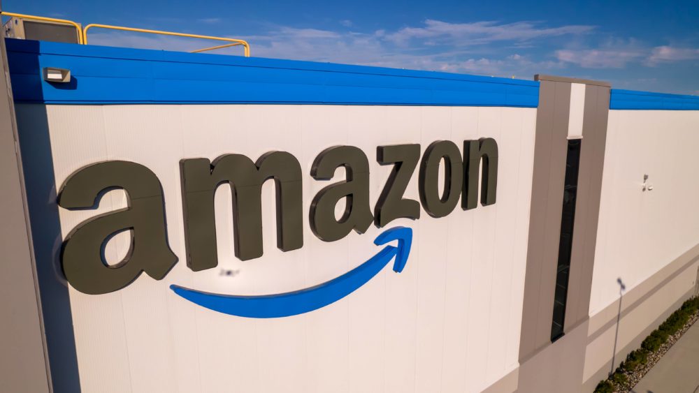 corporate-amazon-logo-brand-name-and-trademark-on-the-office-building-and-fulfillment-warehouse-entrance-company-developed-international-e-commerce