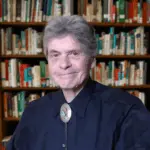 roland-trujillo-headshot-bookshelf