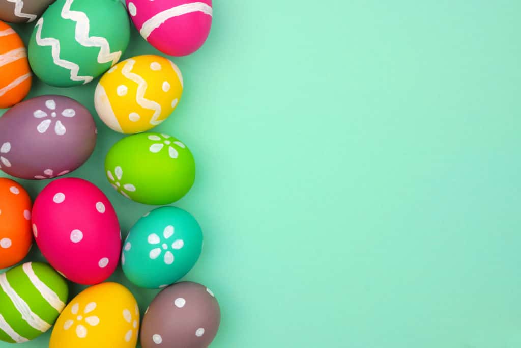 colorful-easter-egg-side-border-against-a-turquoise-green-background