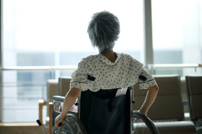 senior-patient-sitting-on-wheelchair-in-hospital