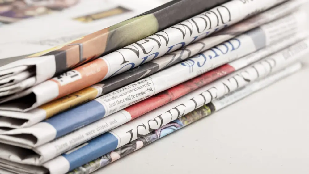 stack-of-newspapers