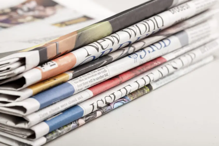 stack-of-newspapers