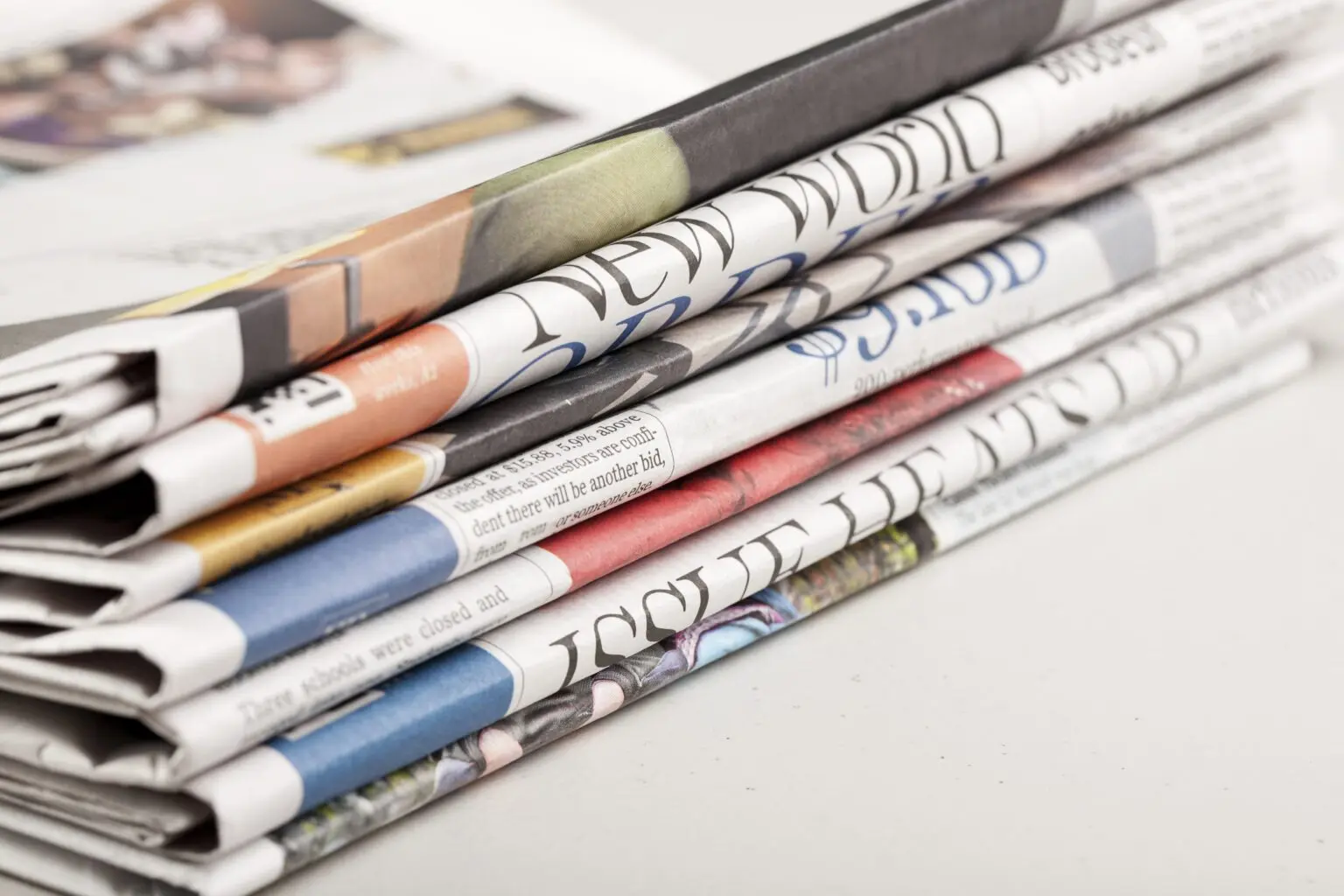 stack-of-newspapers