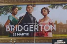 Banner advertising Bridgerton TV Series is displayed on the Unirea Shopping Center^ in downtown Bucharest.