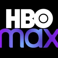 Max or HBO Max logo on TV screen. Man turns on TV with remote control. HBO Max is an American subscription video on-demand streaming service.