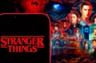 Computer keyboard with the Iphone 11 pro with the Stranger Things logo.
