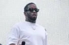 Sean "Diddy" Combs speaks and performs to the crowd after being presented with the key to the city by Mayor Eric Adams on Times Square in New York on September 15^ 2023