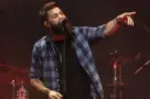 Jordan Davis performs at CMT's RAMJAM on June 3^ 2019 at TopGolf in Nashville^ Tennessee. NASHVILLE^ TN - JUN 3: