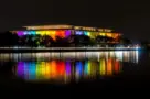 The Kennedy Center illuminated in a rainbow of colors in recognition of the upcoming Kennedy Center Honors. Washington^ DC / USA - November 19^ 2019