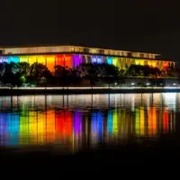 The Kennedy Center illuminated in a rainbow of colors in recognition of the upcoming Kennedy Center Honors. Washington^ DC / USA - November 19^ 2019