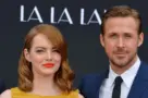 LOS ANGELES^ CA - DECEMBER 7^ 2016: Actors Emma Stone & Ryan Gosling at the TCL Chinese Theatre^ Hollywood^ where the stars of La La Land had their hand & footprints set in cement.
