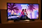 PlayStation 5. New Grand Theft Auto VI Sony PS5 console. Dualsense controller. Man holding joystick and ready to play upcoming GTA 6 game