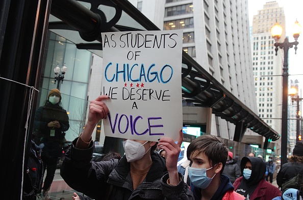 gettyimages_studentsofchicagosign_121922