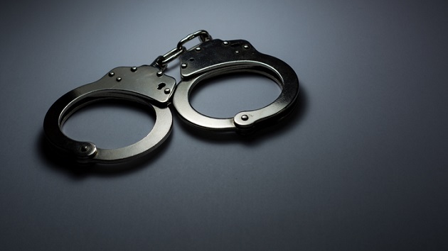 gettyimages_handcuffs_032323917398