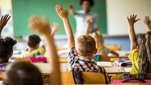 getty_072024_studentsraisinghandsinclassroom-stock760529