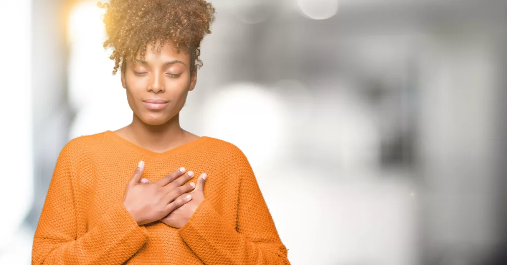 11525-woman-thankful-gratitude-prayer-gettyimages-1645770