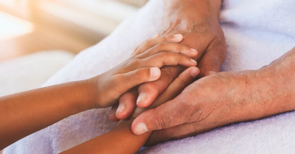 5392-grandchild-grandmother-holding-hands-getty-sa365835