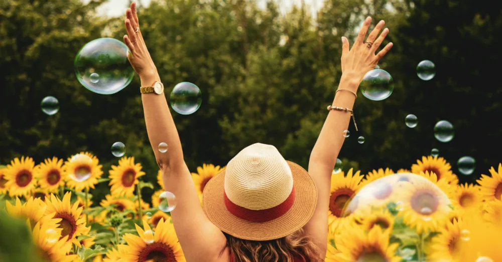 7275-joyful-woman-in-sunflowers-pexels-andre-furta417394