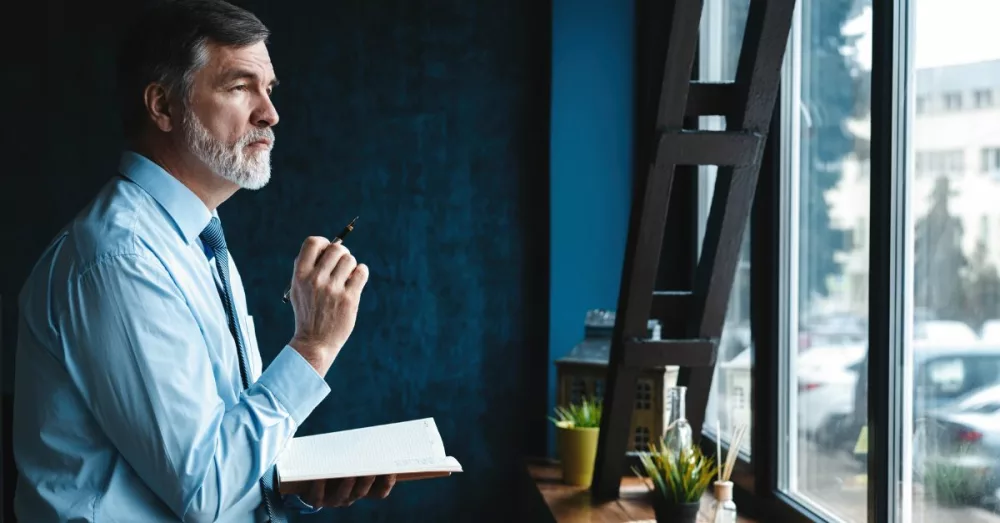 10615-business-man-with-beard-thinking-looking-out441729