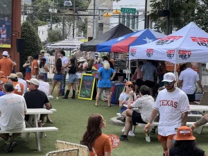 Sponsor Booths at Victory Lap Bar in Austin, Texas Septemebr 14th, 2024 during 102.7 ESPN Austin Tailgate