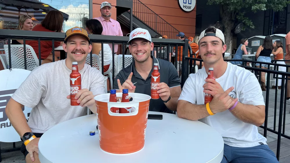 attendees enjoy bud lights at Victory Lap Bar in Austin, Texas September 14th, 2024 during 102.7 ESPN Austin Tailgate