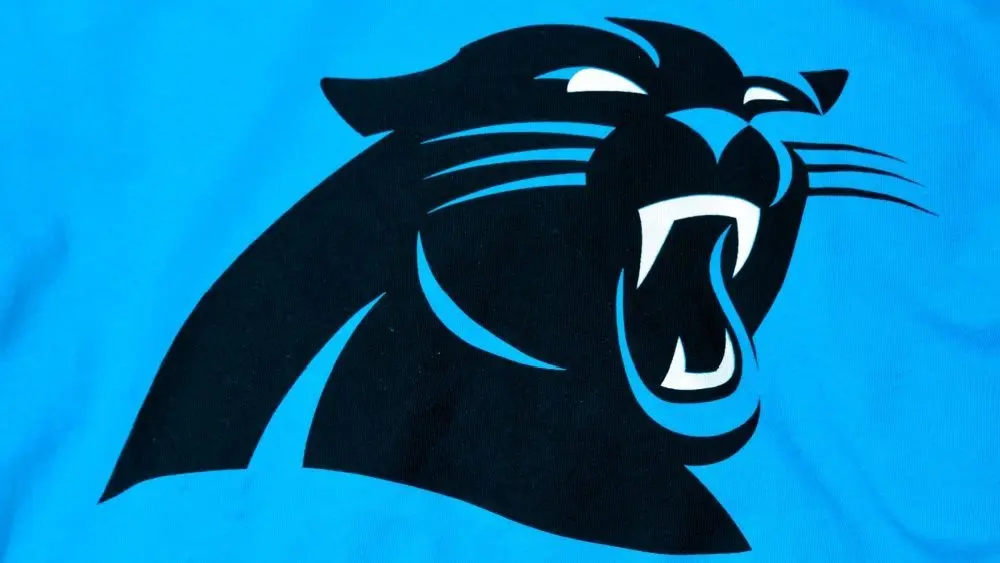 NFL Carolina Panthers club logo printed on textile equipment^ blue background^product shot