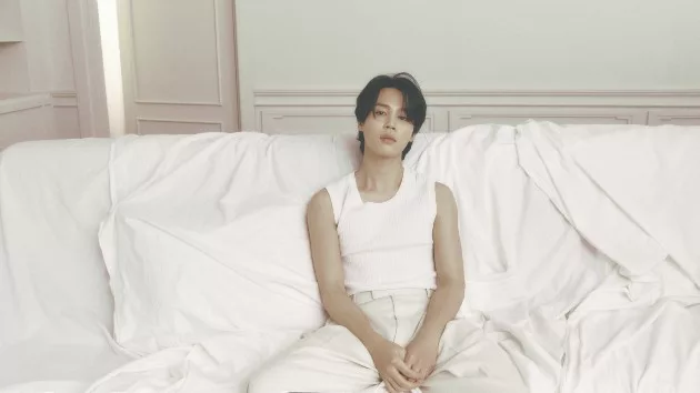 m_jiminofbtssittingonwhitesheets_122223530222