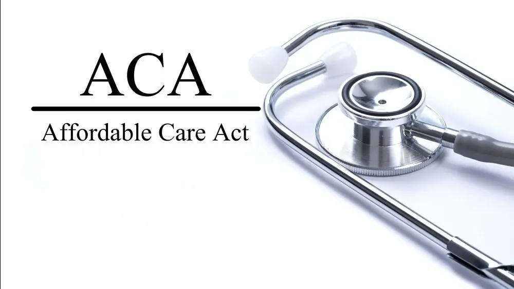 Page with ACA (Affordable Care Act) on the table with stethoscope^ medical concept