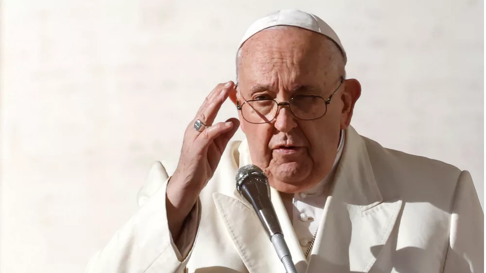 Pope Francis delivers his blessing to the faithful in St. PeterÕs Square at the Vatican^ November 22^ 2023.