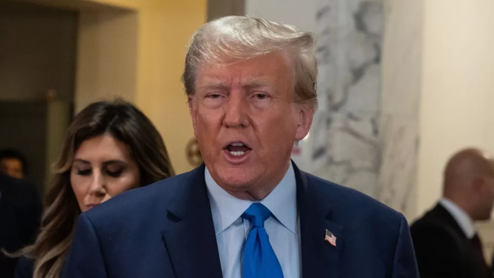 Former President Donald Trump speaks to press before the start of civil fraud trial brought by NYS Attorney General Letitia James at NYS court in New York on October 2^ 2023