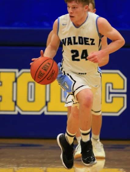bennett-hinkle-dribbles-down-the-court-during-monroe-tournament-in-anchorage-bennett-was-named-to-the-all-tournament-team-along-with-logan-heckathorn-18boysvhsvgrace