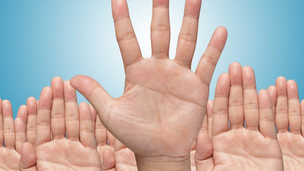 many-hands-raise-high-up