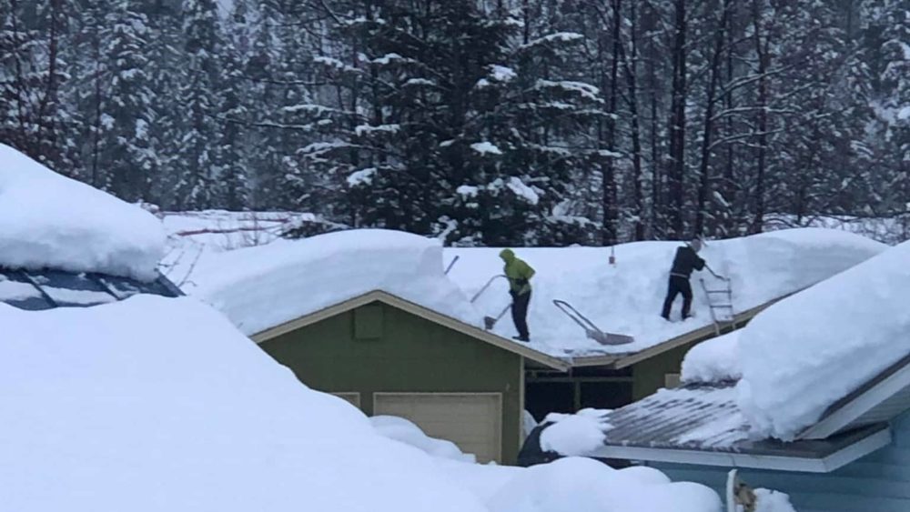 guys-on-roof-shoveling-susan-cronk-cropped-2
