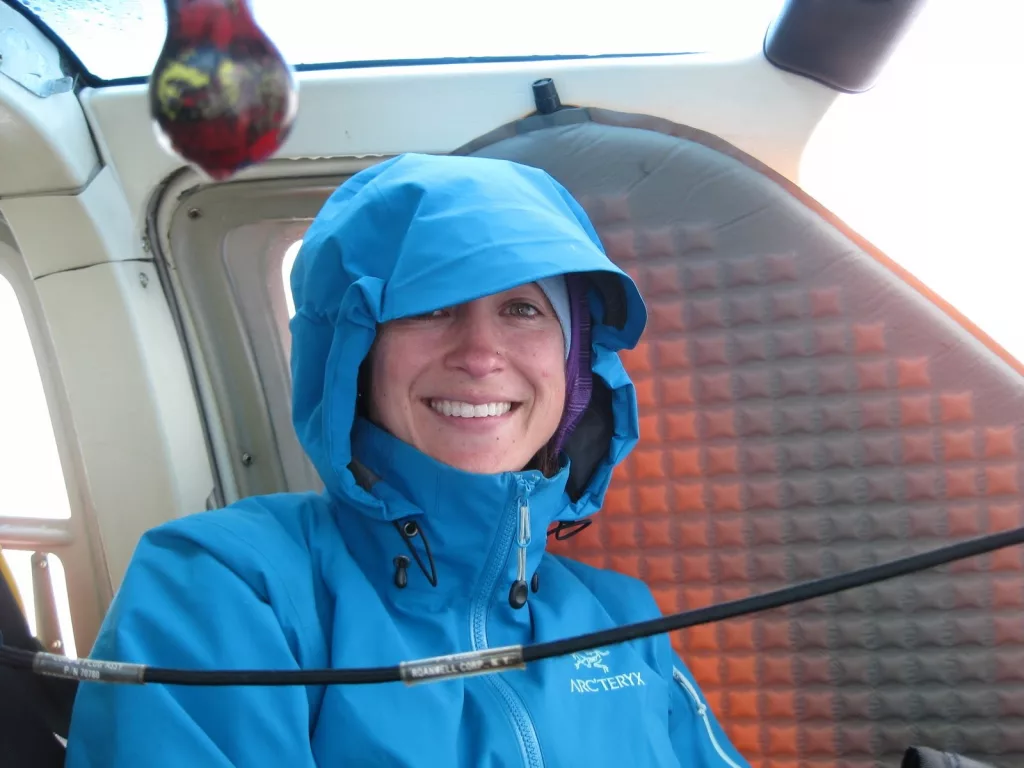 Volcano researcher Taryn Lopez smiles during her 48-hour wait inside a stranded Jet Ranger helicopter on top of Mount Mageik. Photo courtesy of Taryn Lopez.