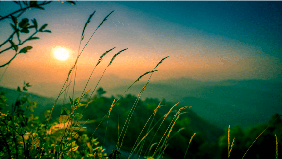 View of the mountains and sun