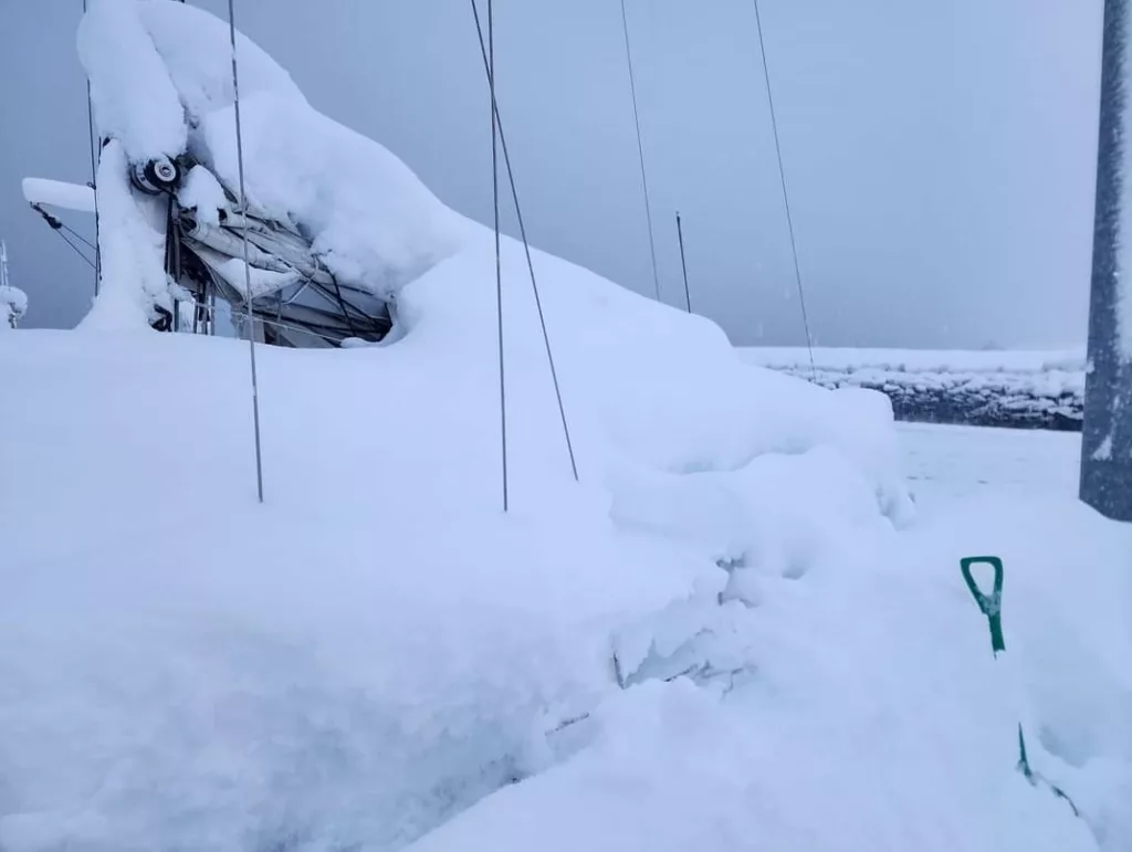 Boat buried in snow