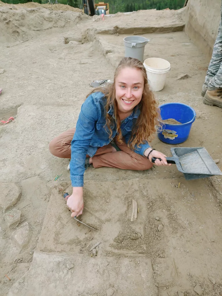UAF Ph.D. student Audrey Rowe trowels loess soil at an archeological site in the uplands of Interior Alaska. Photo by Mat Wooller.