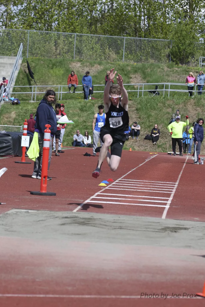 Barrett McCumby in the Triple jump, Track & Field State Championships