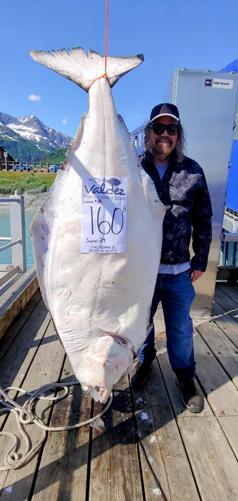 Jeff Smith and his 160.8 pound halibut