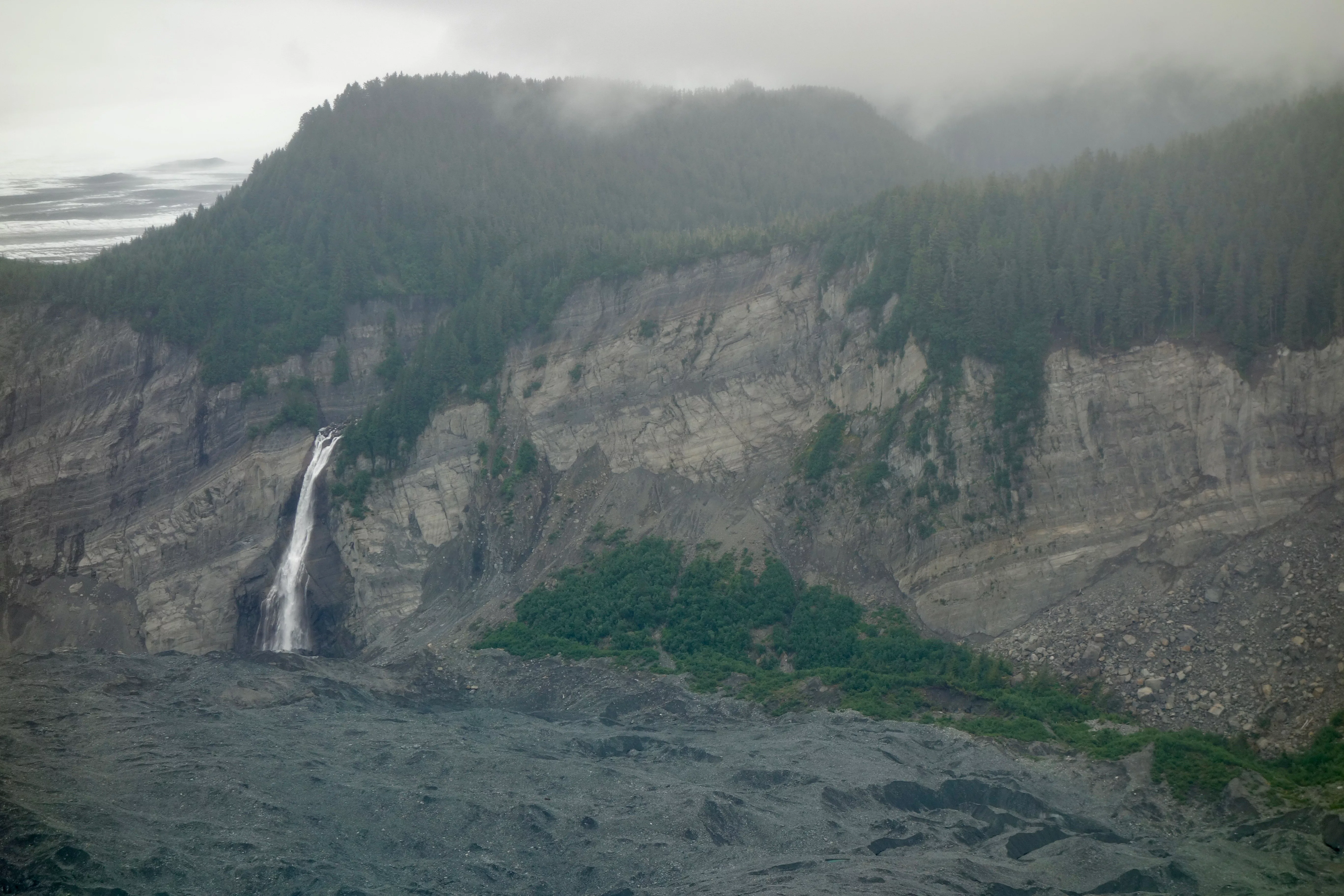 A waterfall leaps from a cliff south of Yakutat on the Pacific Ocean coast. Photo by Ned Rozell.