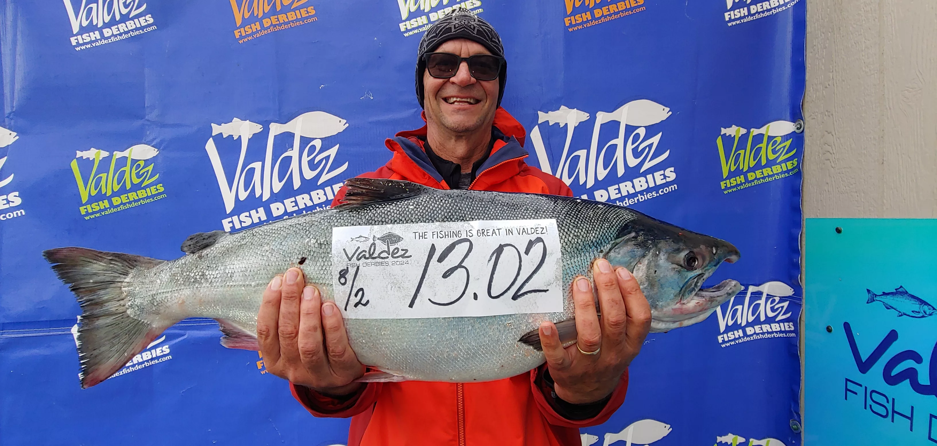 Joel Stephens of Ardmore, Oklahoma and his 13.02 lb silver salmon
