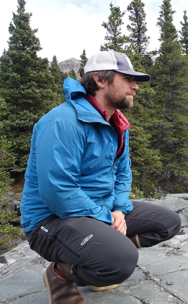 Phillip Wilson listens to Dan Mann talk about the surges of Black Rapids Glacier at a military training site south of Delta Junction. Photo by Ned Rozell.