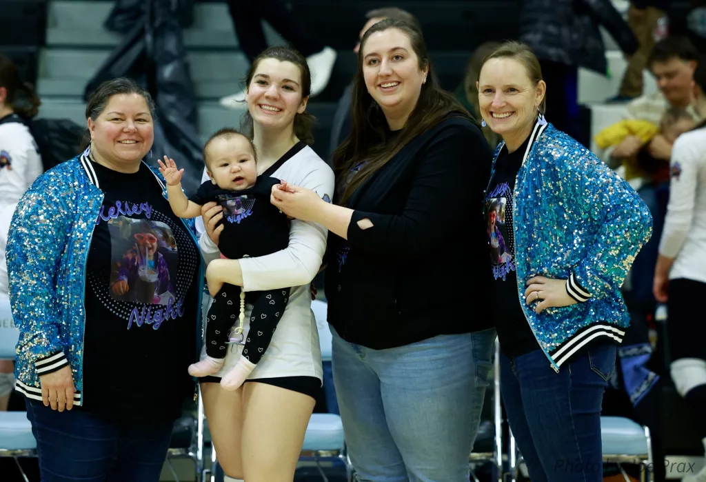 Kelsey Prax with Coaches & Baby. Photo by Joe Prax
