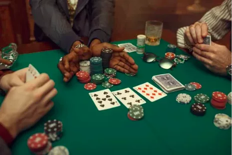 Poker table with people playing