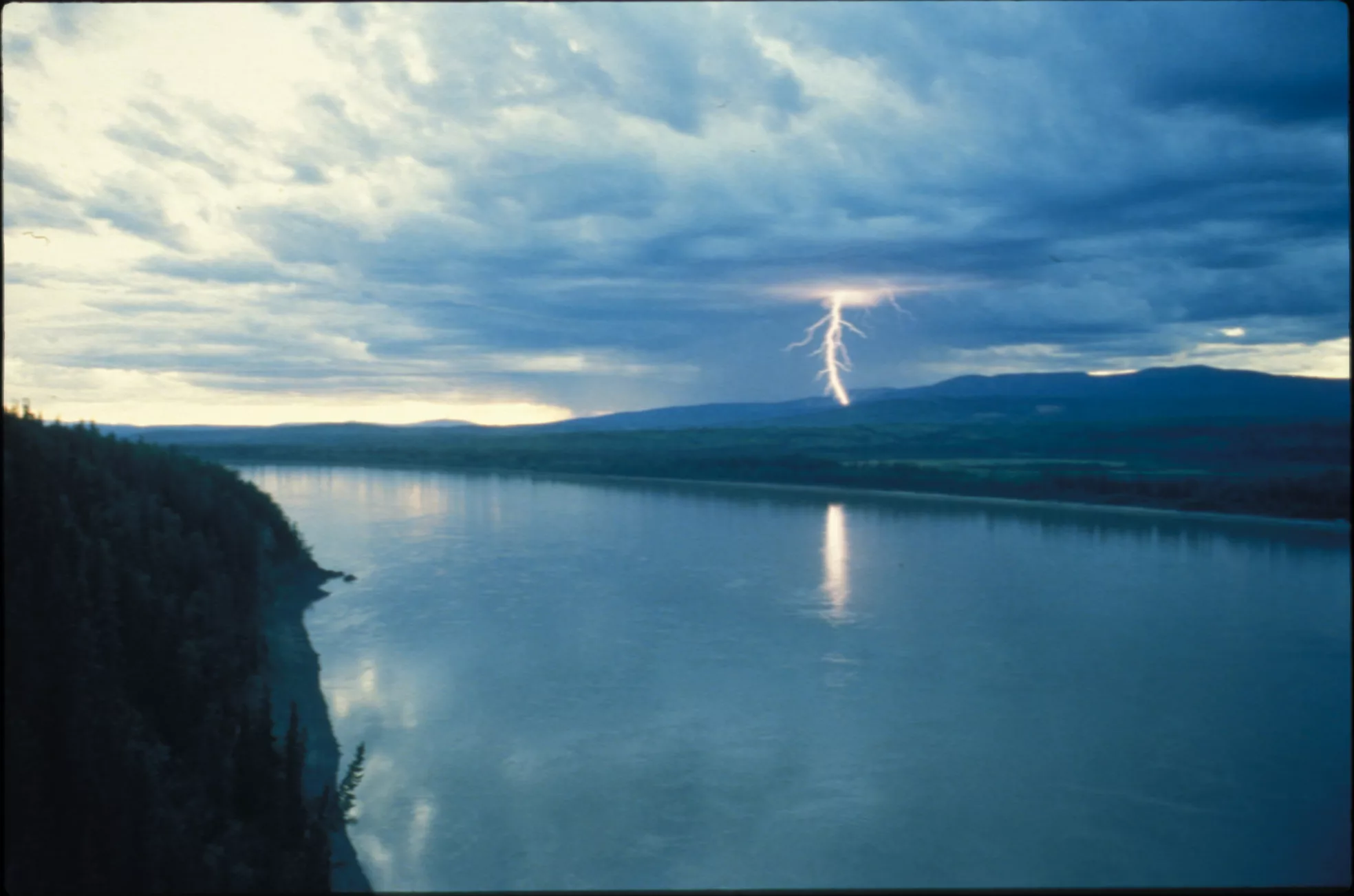 A lightning strike like this one in the Ray Mountains north of the Yukon River may have been responsible for the mysterious death of caribou in June 1972. Photo by Ned Rozell.
