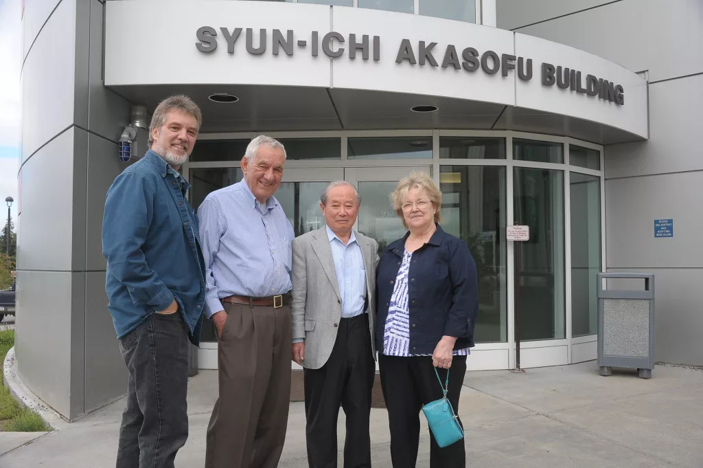 2. From left, Joseph Shaw, his father Glenn Shaw, Syun-Ichi Akasofu and Gladys Shaw pose in front of the Syun-Ichi Akasofu Building on the University of Alaska Fairbanks campus. Photo courtesy of Syun-Ichi Akasofu.