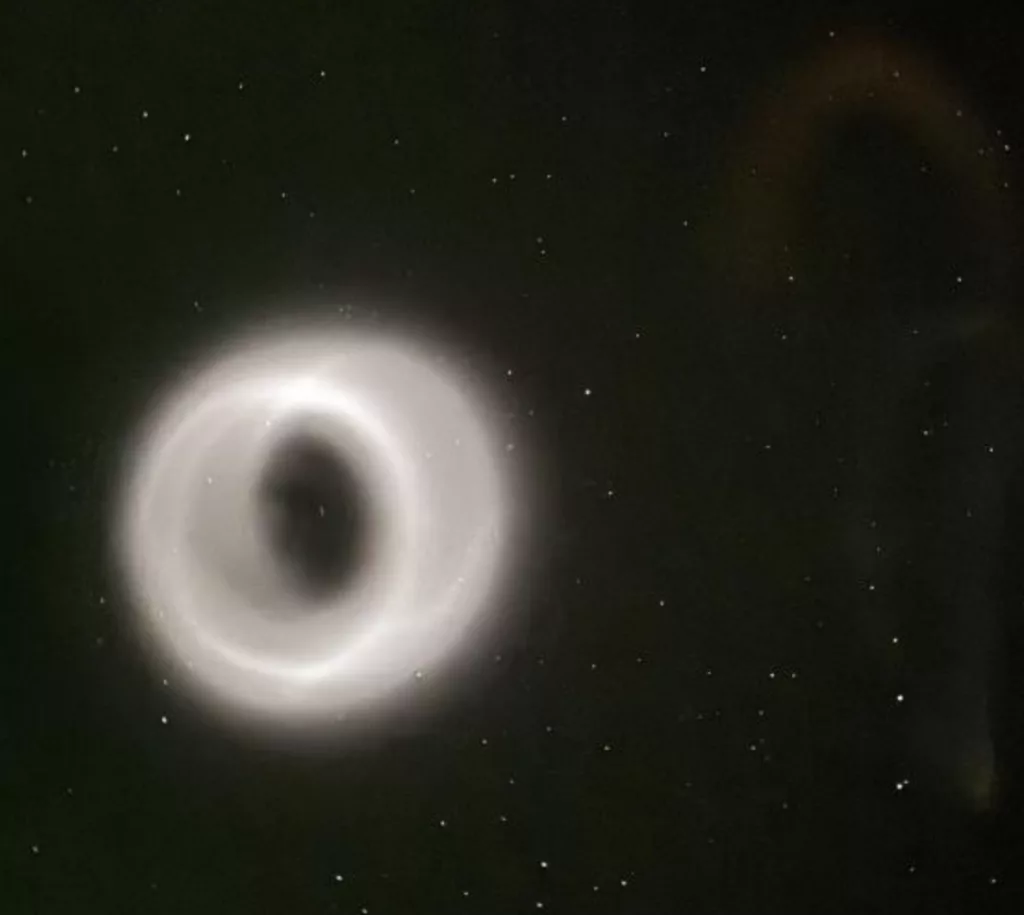 
The vapor tracer payload from a sounding rocket that launched from Poker Flat Research Range on March 29 had a malfunction that caused the tracer material to appear as a large doughnut of cylinder seen widely across central Alaska. UAF photo by Eric Marshall