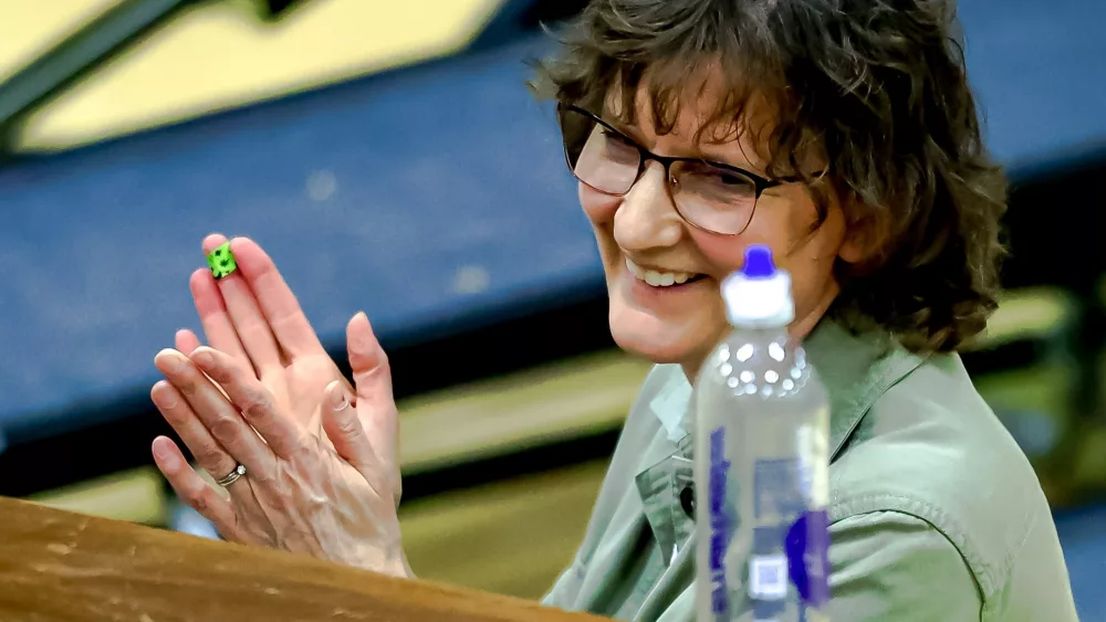 2025 Aurora Band Concert, Ann Norris appreciating the music at Aurora Music Festival. Norris is the music director at Valdez High School and did much of the work behind the scenes to bring the festival to Valdez, J Prax