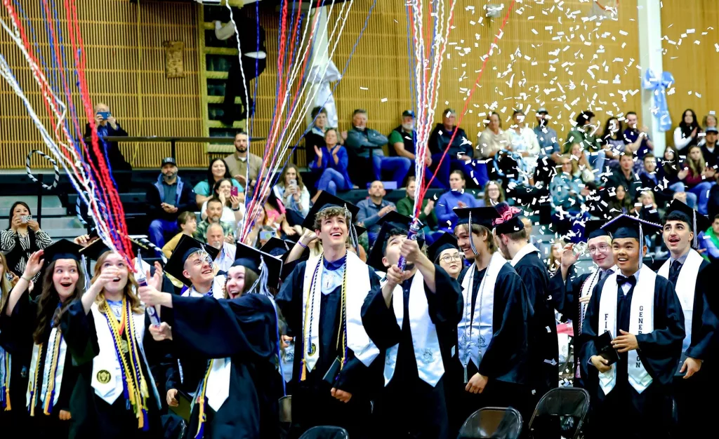 VHS 2025 graduates celebrating with confetti, Photo by Joe Prax