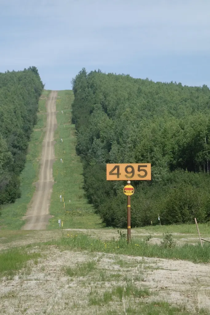 A section of below-ground trans-Alaska pipeline is buried beneath a south-facing hillside near the Salcha River. Photo by Ned Rozell.